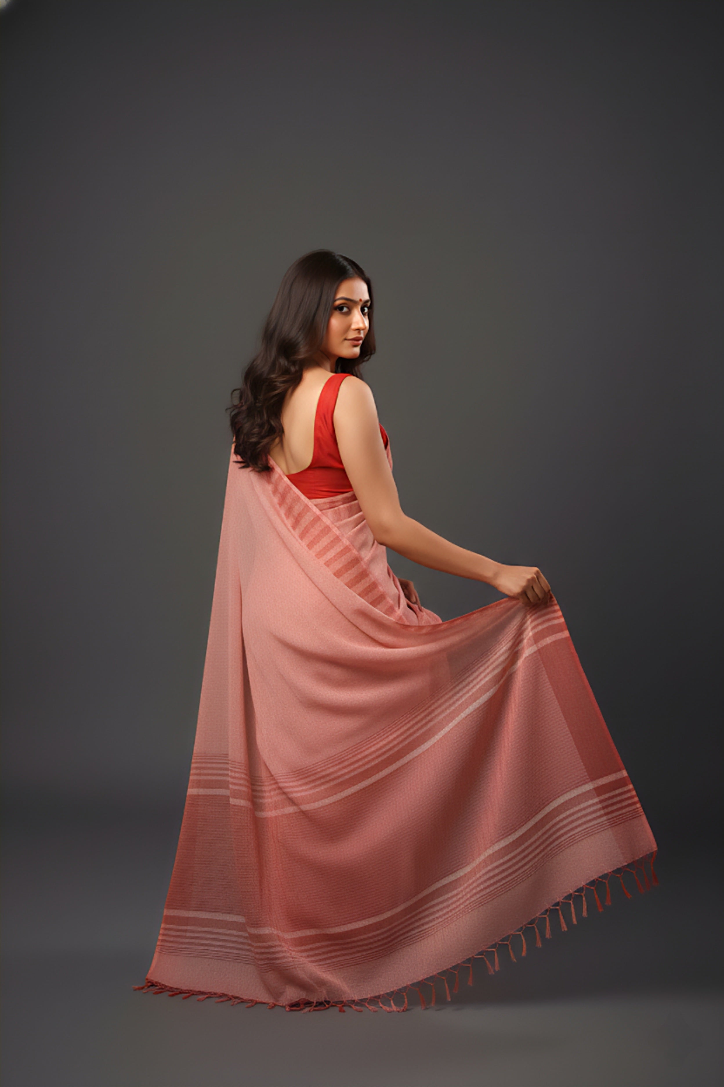 Graceful Red Brasso Saree with Floral Prints & Stylish Striped Edges
