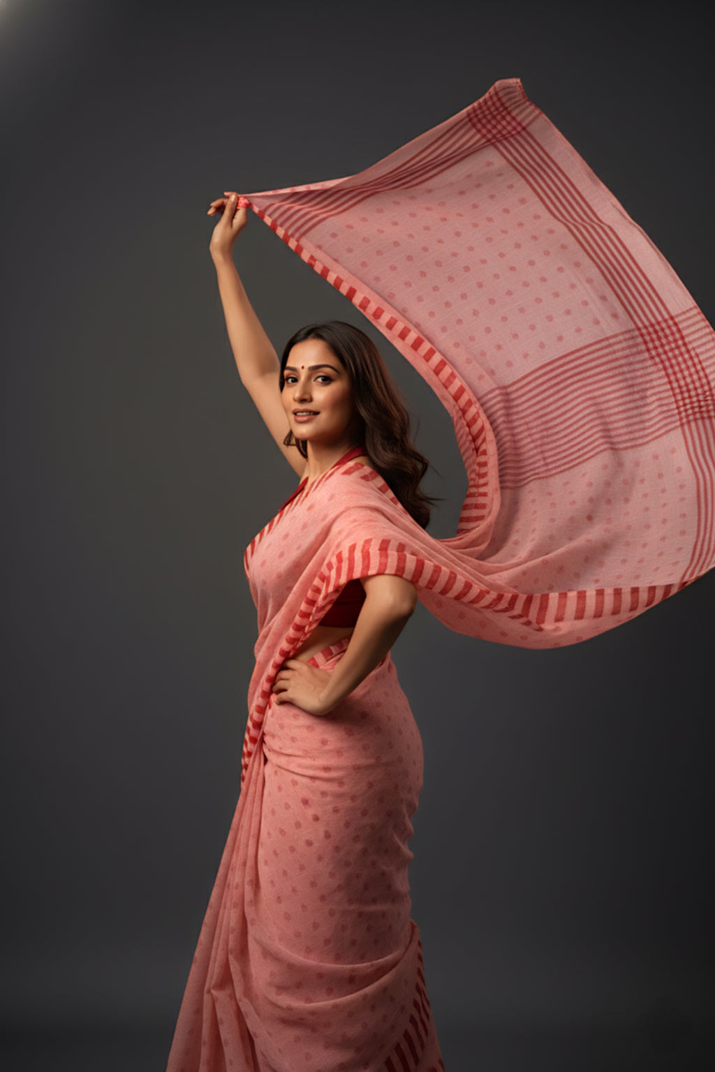 Graceful Red Brasso Saree with Floral Prints & Stylish Striped Edges