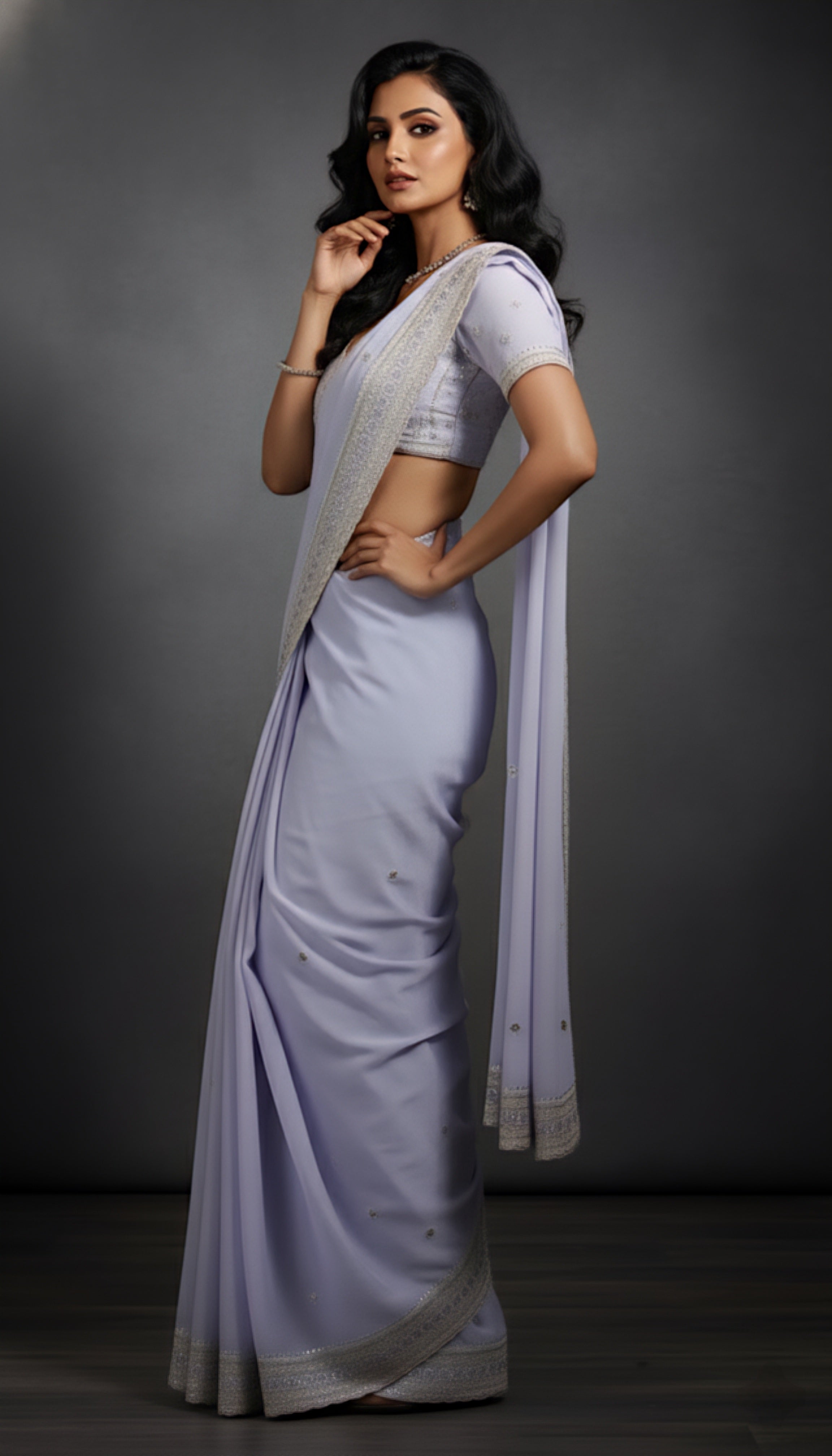 Graceful Sky Blue Tissue Saree with Handcrafted Sequin Detailing