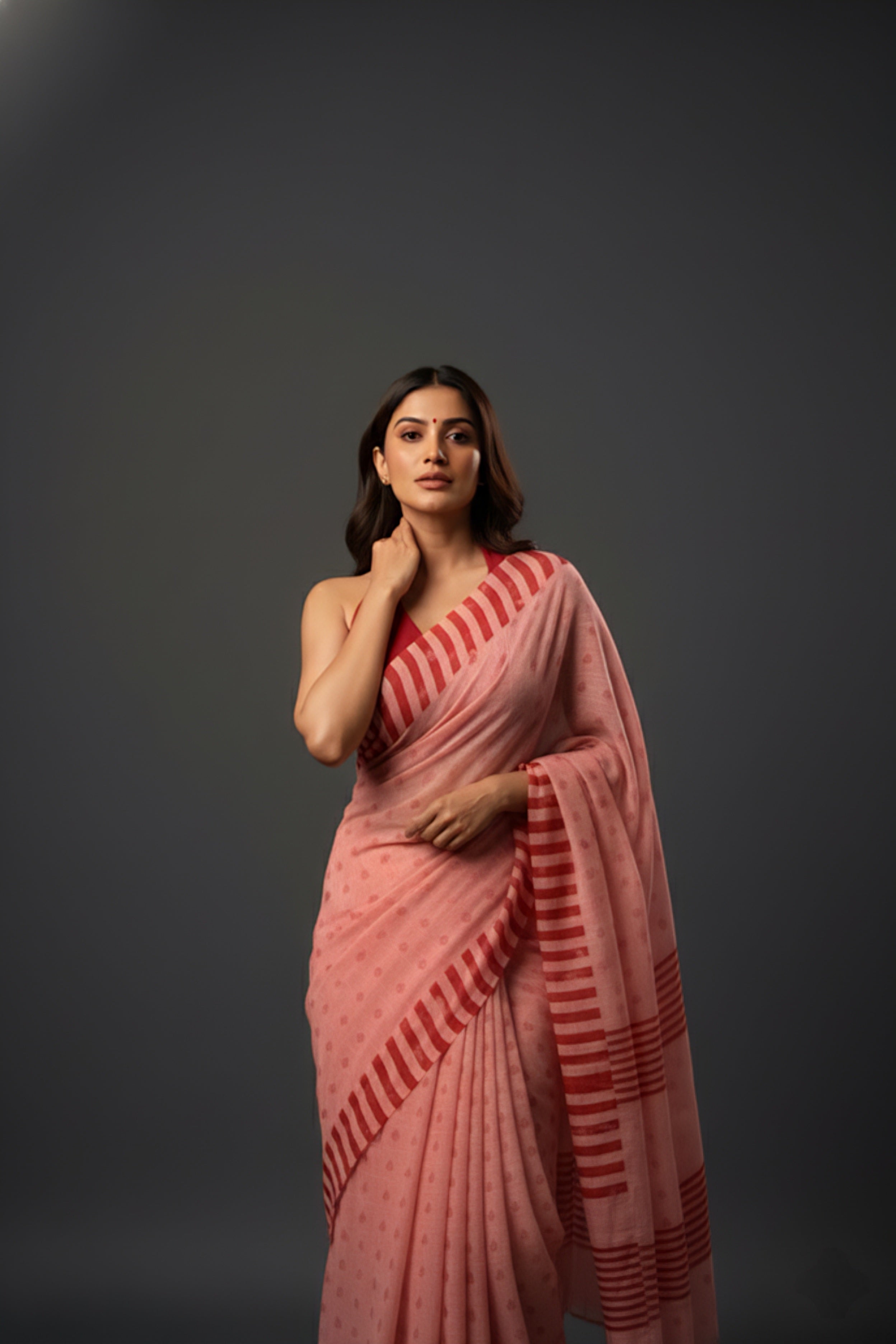 Graceful Red Brasso Saree with Floral Prints & Stylish Striped Edges