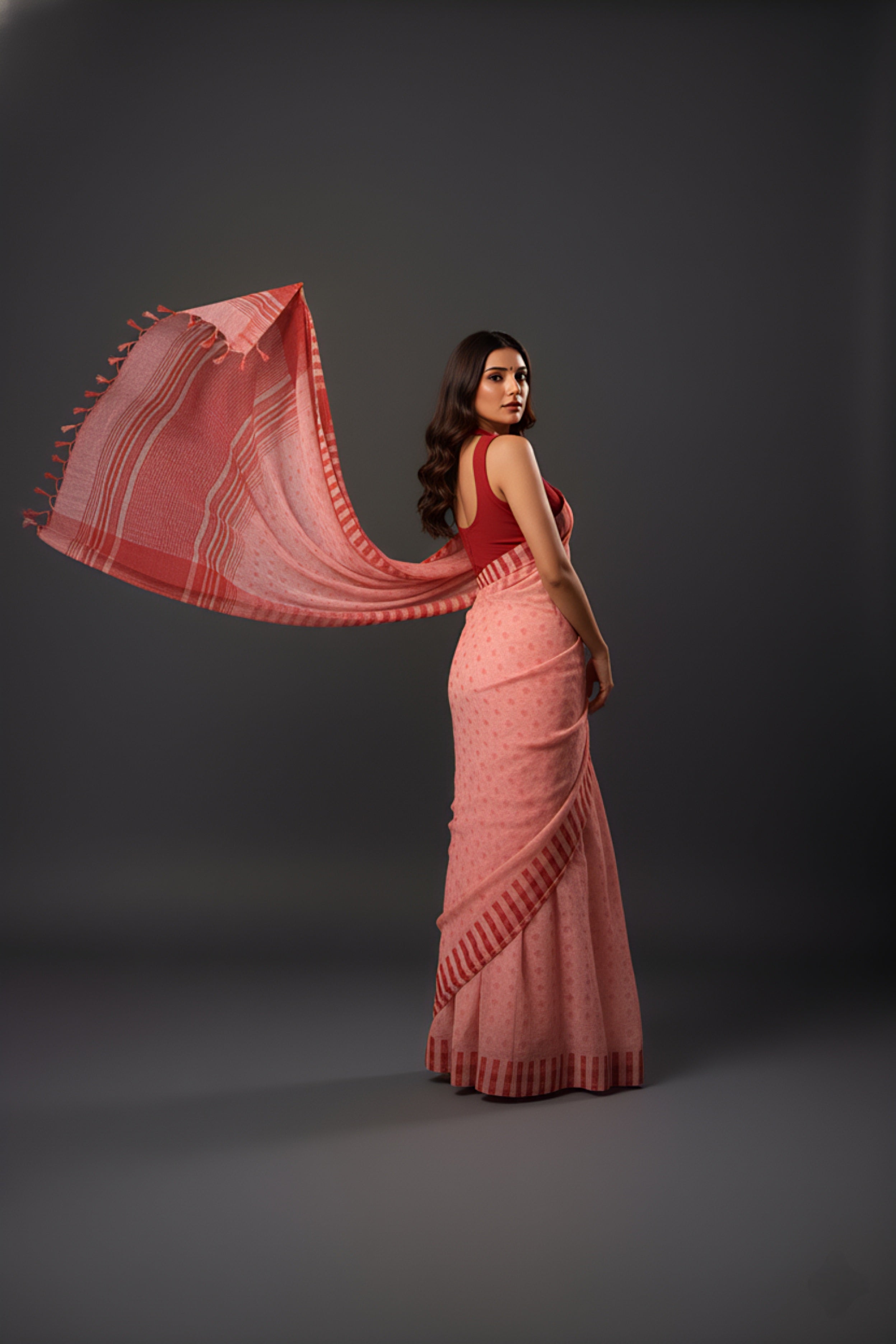 Graceful Red Brasso Saree with Floral Prints & Stylish Striped Edges