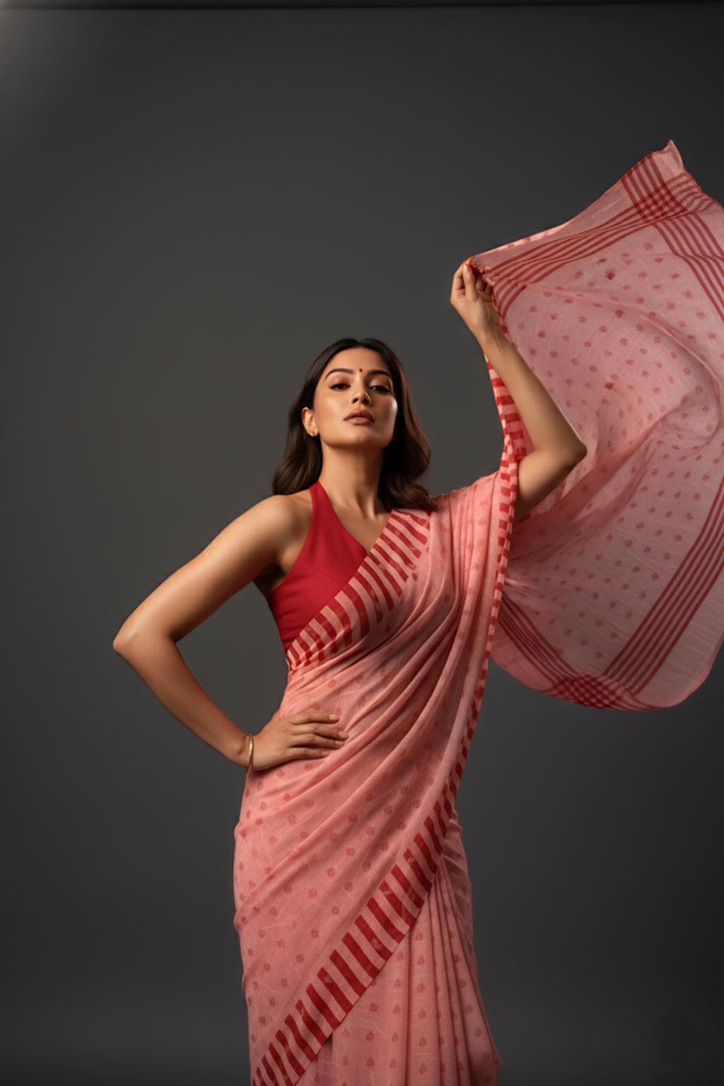Graceful Red Brasso Saree with Floral Prints & Stylish Striped Edges