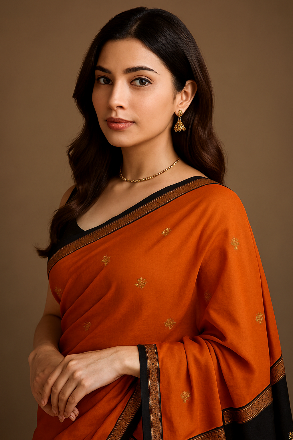 Traditional Banarasi zari saree in elegant orange with golden tones
