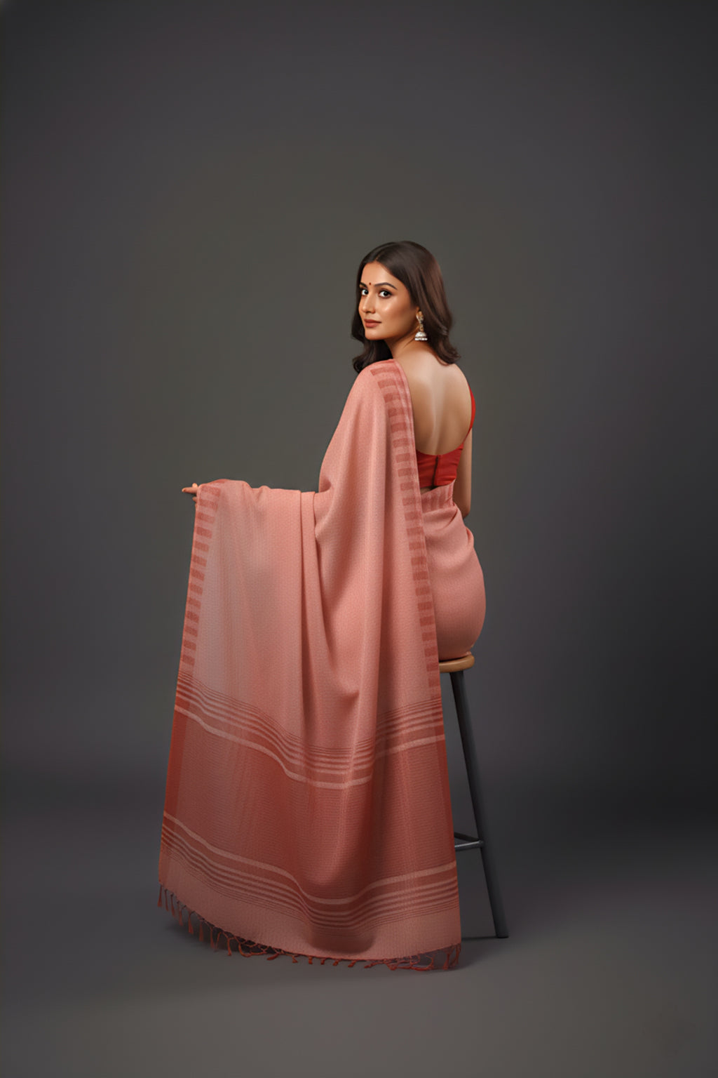 Graceful Red Brasso Saree with Floral Prints & Stylish Striped Edges